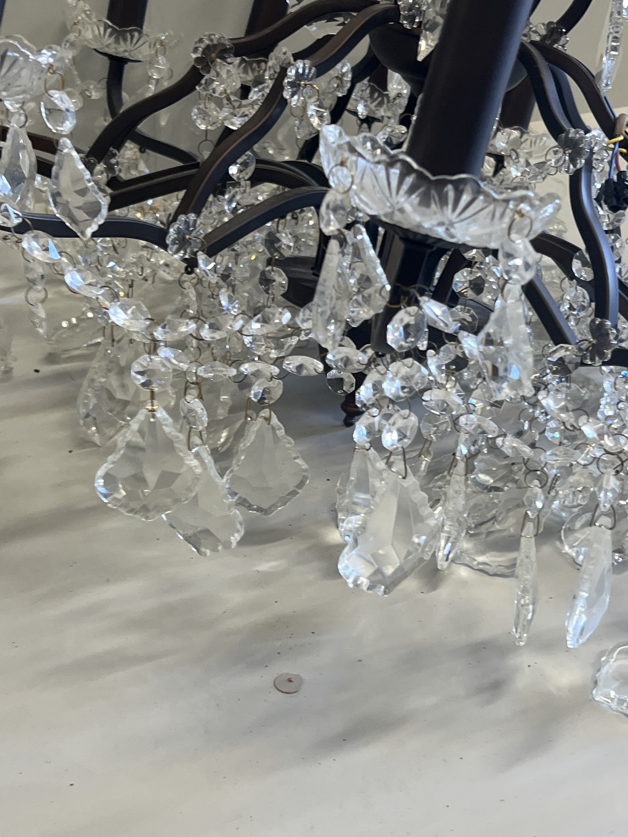 A twelve branch cut glass electrolier, diameter 84cm